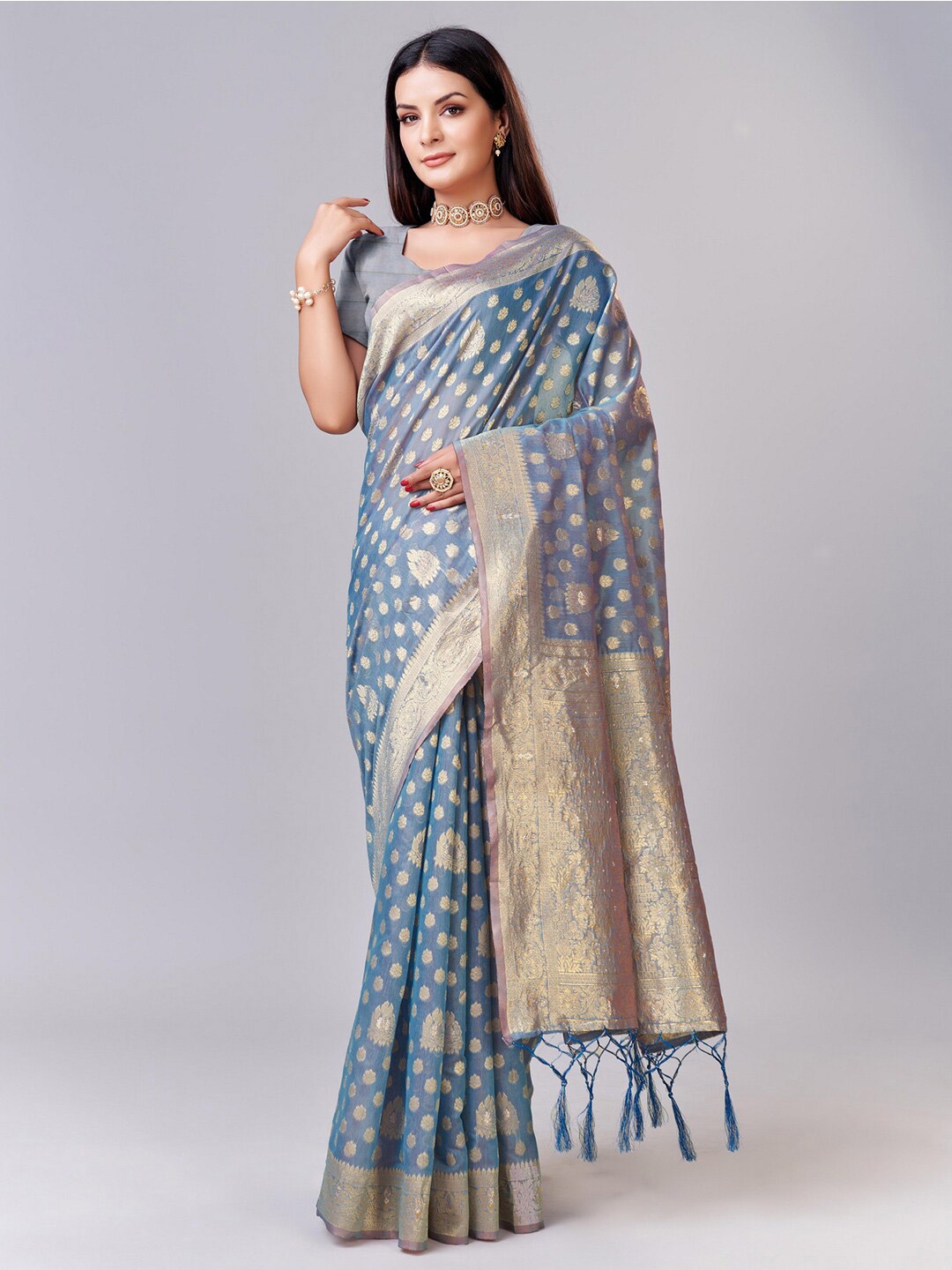 

Mitera Turquoise Blue & Gold-Toned Ethnic Motifs Woven Design Zari Saree