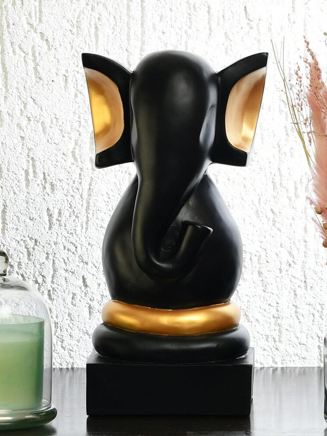 

Athome by Nilkamal Black & Gold Toned Vighnaharta Ganesha Showpiece
