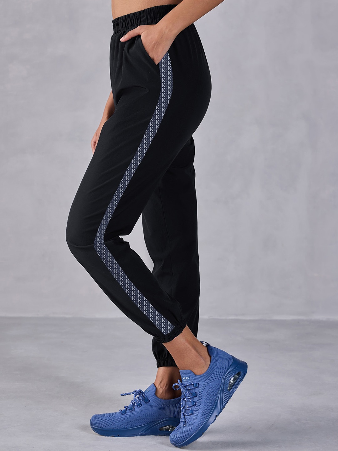 

KICA Women Mid Rise Side Striped Relaxed Fit Dry Fit Joggers, Black
