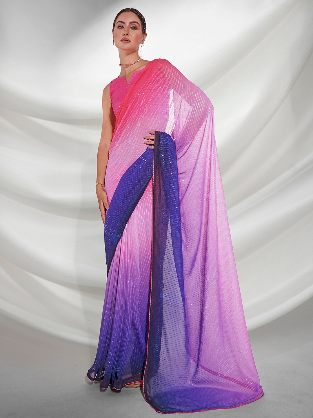 

Mitera Pink & Purple Embellished Sequinned Pure Georgette Saree