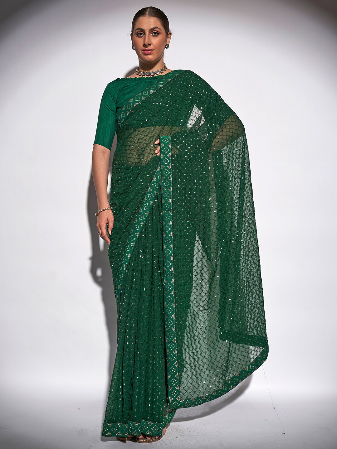 

Mitera Green & Gold-Toned Embellished Sequinned Pure Georgette Saree
