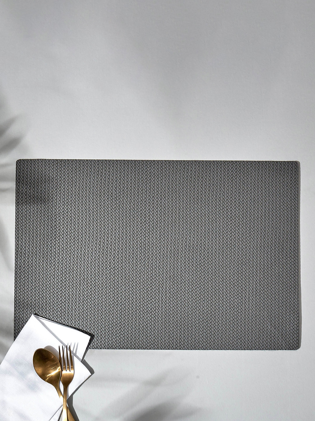 

Home Centre Grey & Black Marshmallow Fishbone PVC Placemat