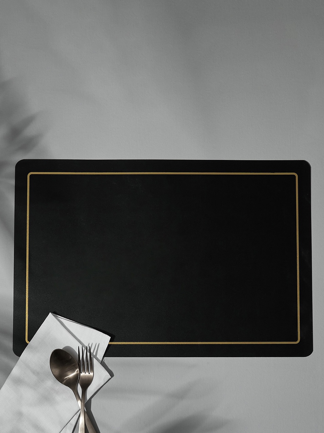 

Home Centre Black Andrey Rectangle Table Placemat