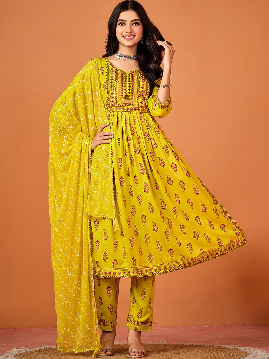 

Sangria Ethnic Motifs Printed Sequinned A Line Kurta With Trousers & Dupatta, Mustard