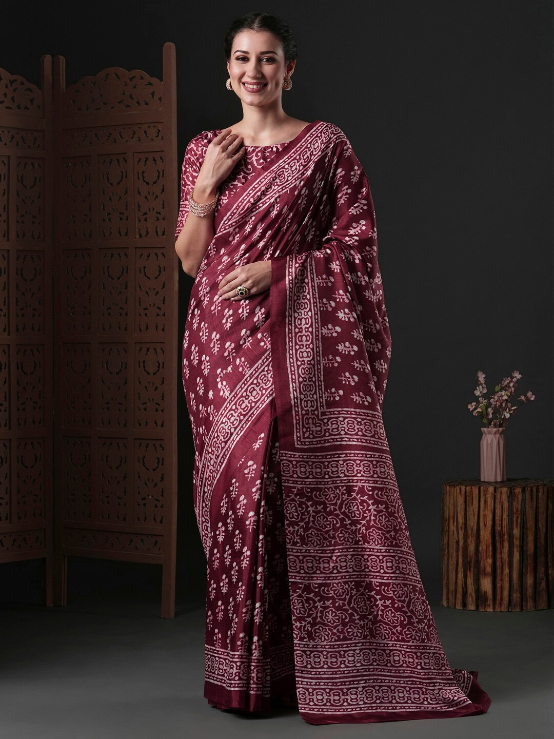 

Anouk Rustic Ethnic Motifs Printed Dabu Saree, Magenta