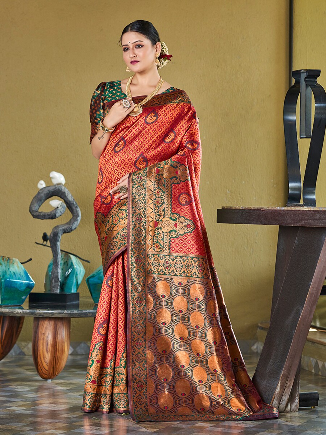 

Mitera Red & Green Ethnic Motif Woven Design Zari Banarasi Sarees