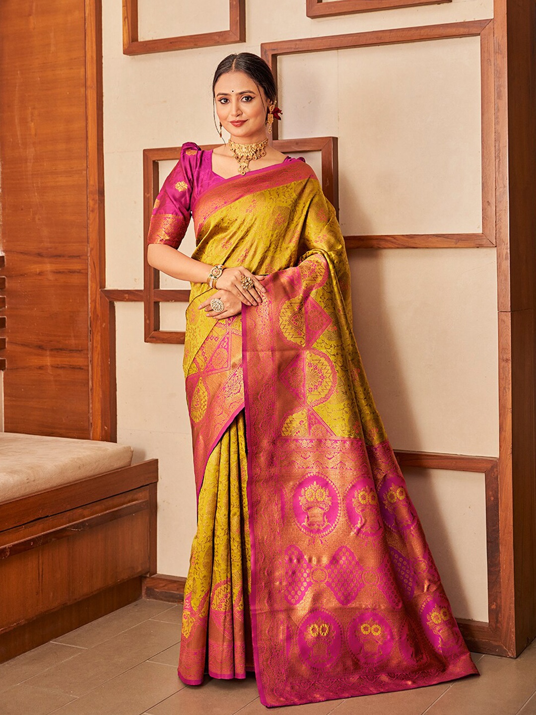 

Mitera Yellow & Pink Ethnic Motifs Woven Design Zari Banarasi Saree