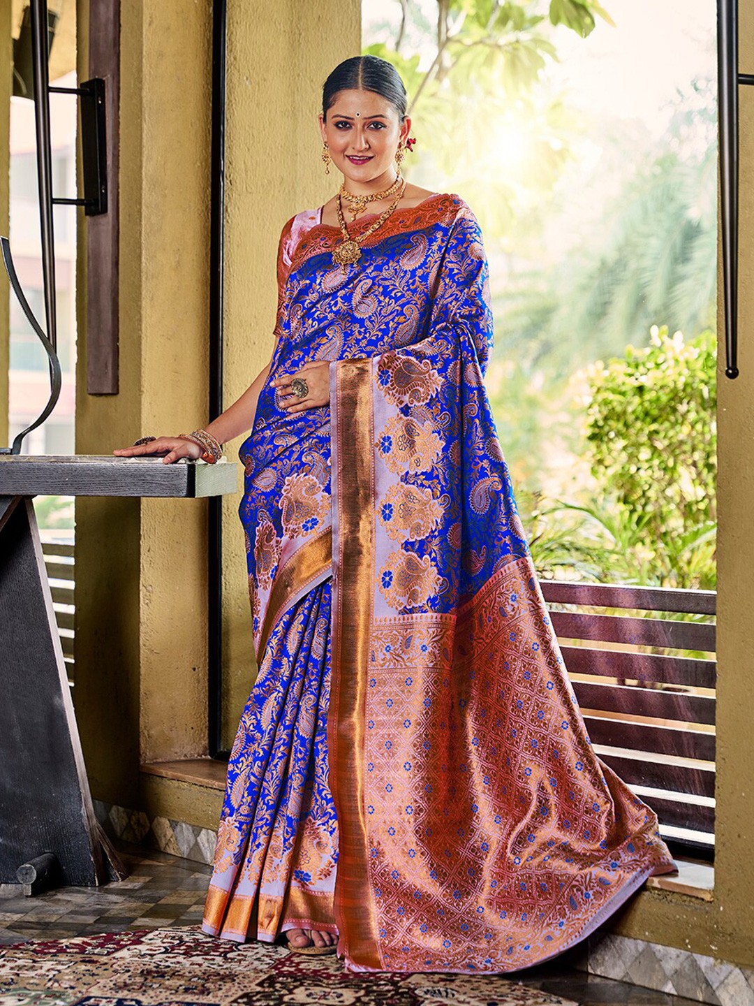 

Mitera Blue & Copper-Toned Ethnic Motifs Woven Design Zari Banarasi Saree
