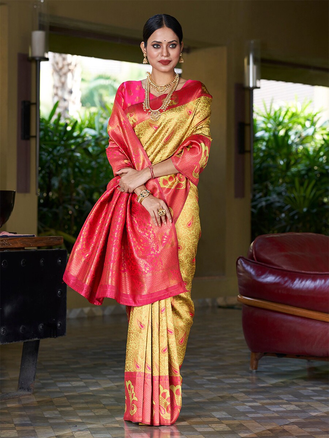 

Mitera Yellow & Pink Woven Design Zari Silk Blend Banarasi Saree