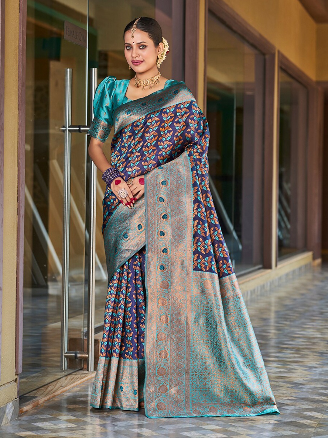 

Mitera Blue & Gold-Toned Floral Woven Design Zari Banarasi Saree