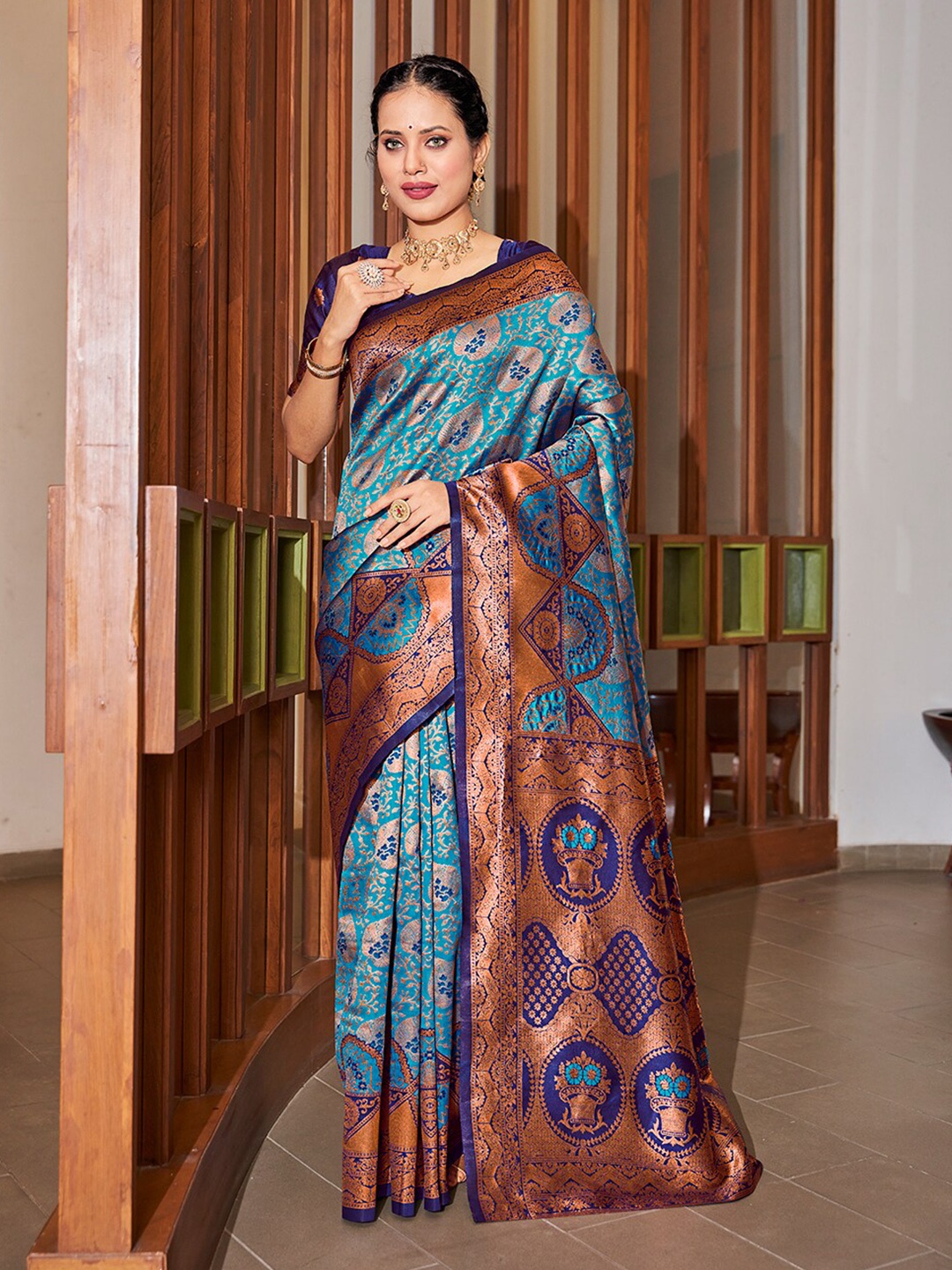 

Mitera Turquoise Blue & Navy Blue Ethnic Motifs Woven Design Zari Banarasi Saree