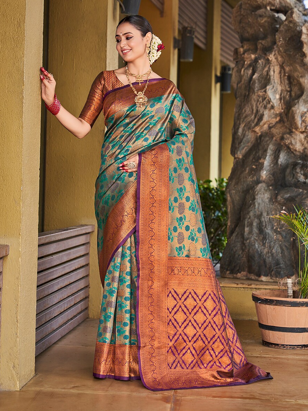 

Mitera Teal & Purple Woven Design Zari Banarasi Saree