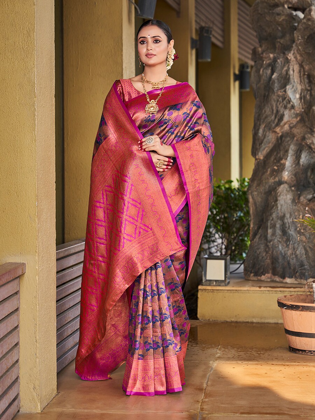 

Mitera Purple & Pink Ethnic Motifs Woven Designed Zari Banarasi Saree
