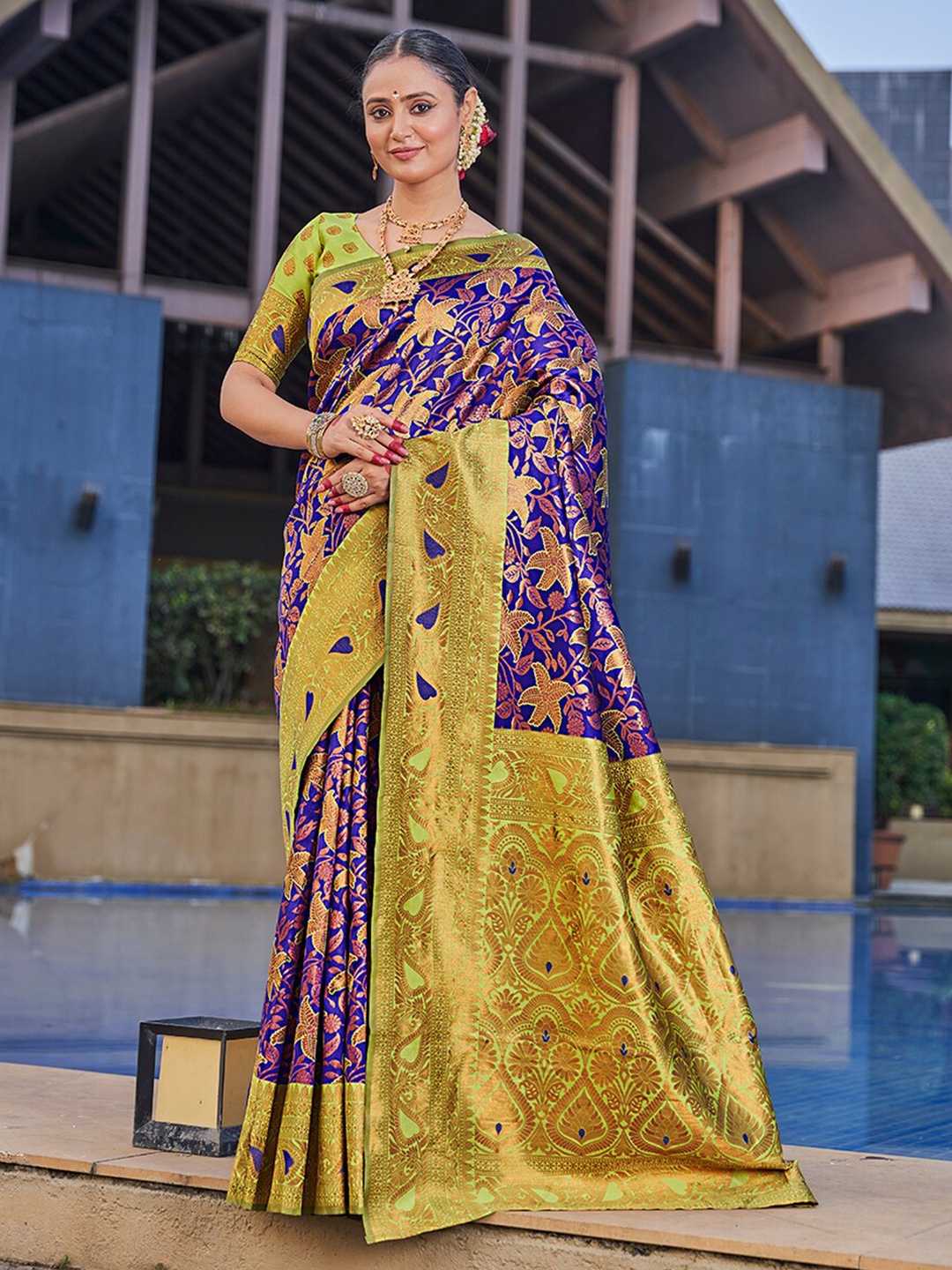 

Mitera Purple & Green Ethnic Motifs Woven Design Zari Banarasi Saree