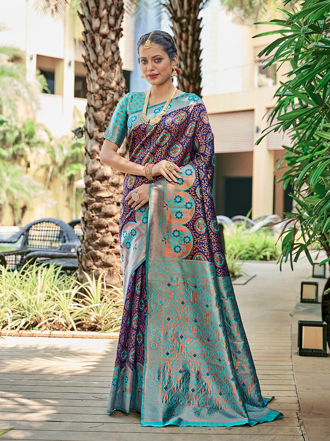 

Mitera Blue Ethnic Motifs Woven Design Zari Banarasi Saree