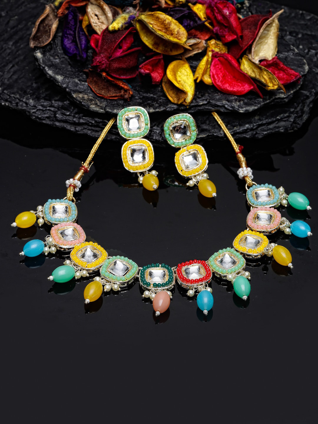 

Sukkhi Gold Plated Kundan Studded & Beaded Jewellery Set
