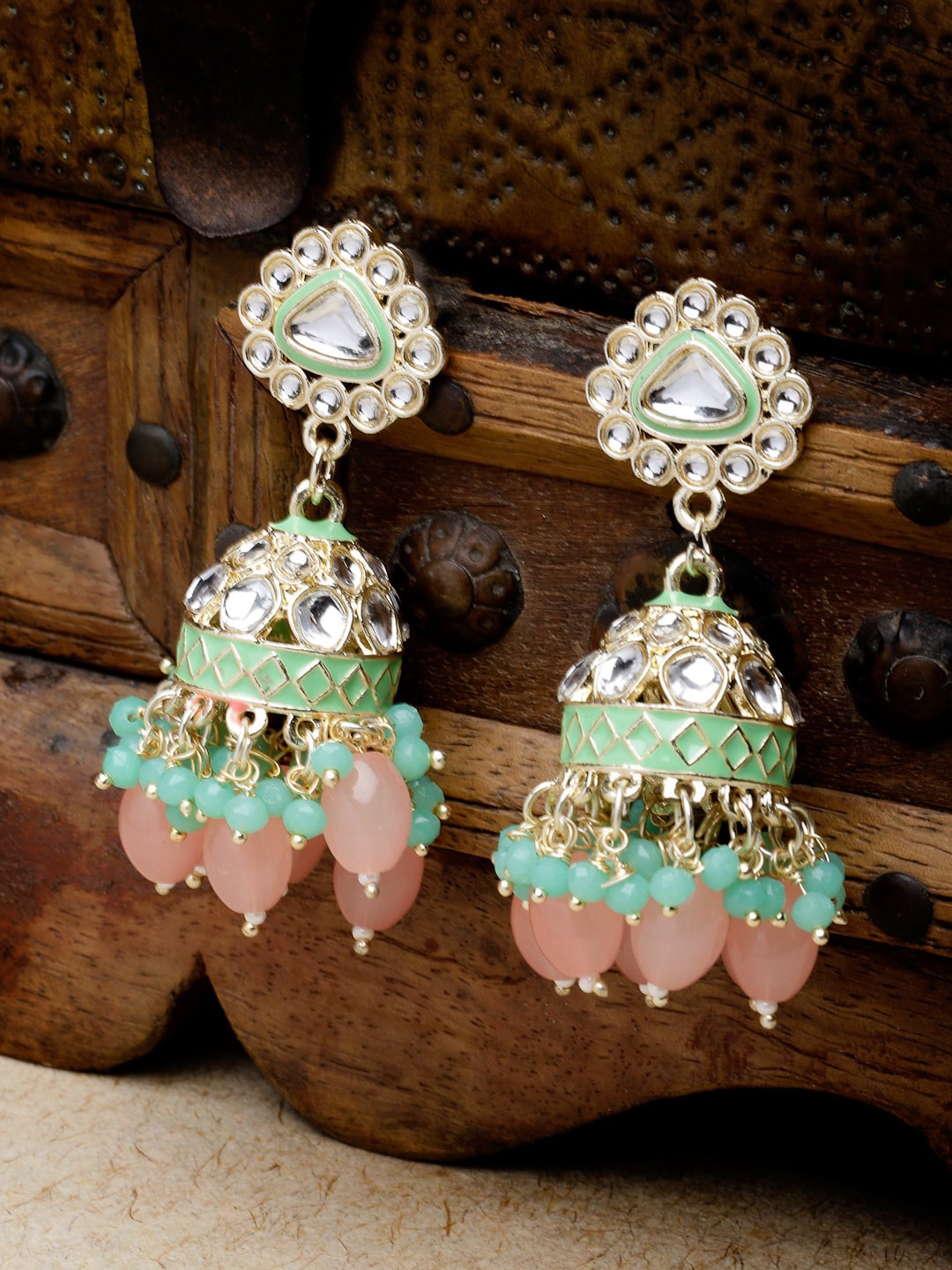 

Sukkhi Gold Plated Kundan Studded Meenakari Jhumkas