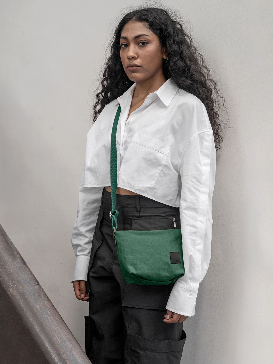 

DailyObjects Structured Sling Bag, Green