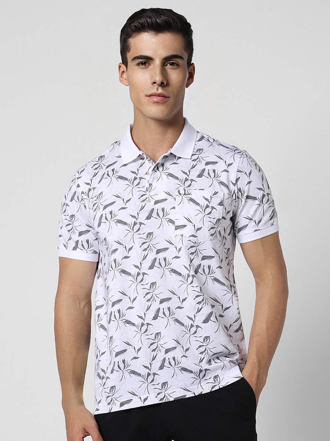 

Van Heusen Sport Men White Printed Polo Collar Tropical Pockets T-shirt