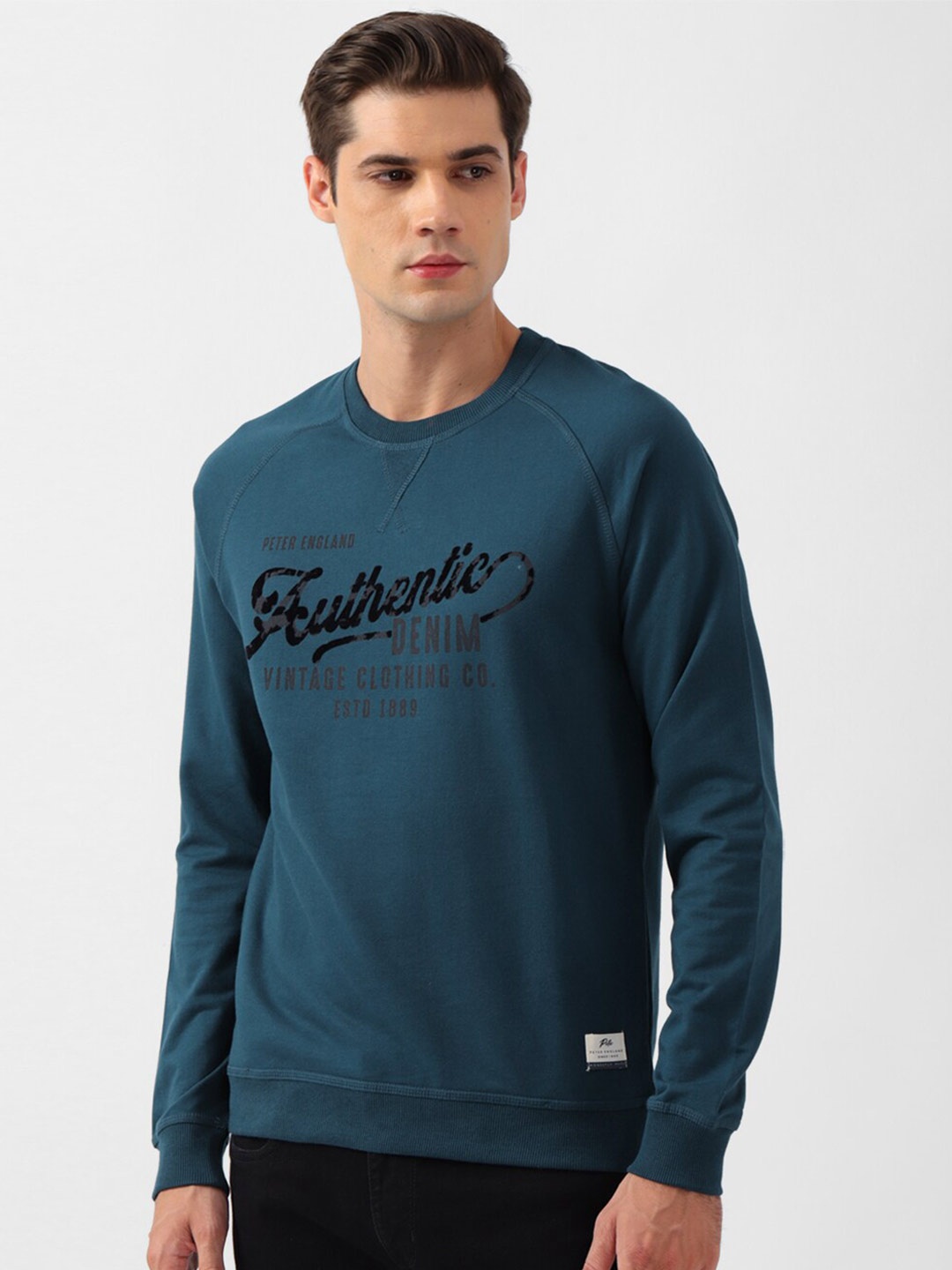 

Peter England Casuals Men Blue Printed Sweatshirt