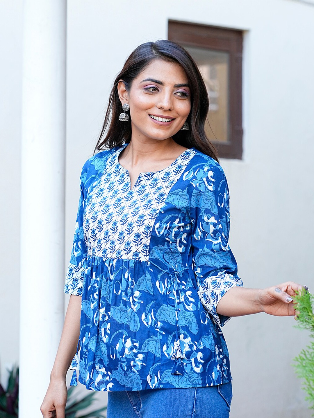 

GULAB CHAND TRENDS Blue Floral Print Cotton Tiered Top