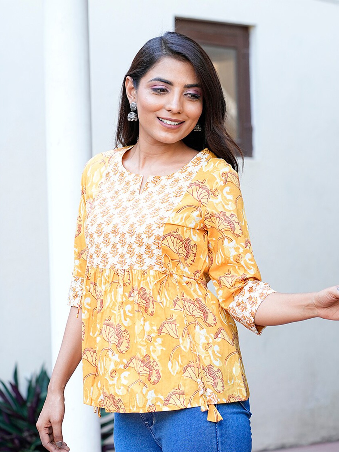 

GULAB CHAND TRENDS Yellow Floral Print Cotton Top