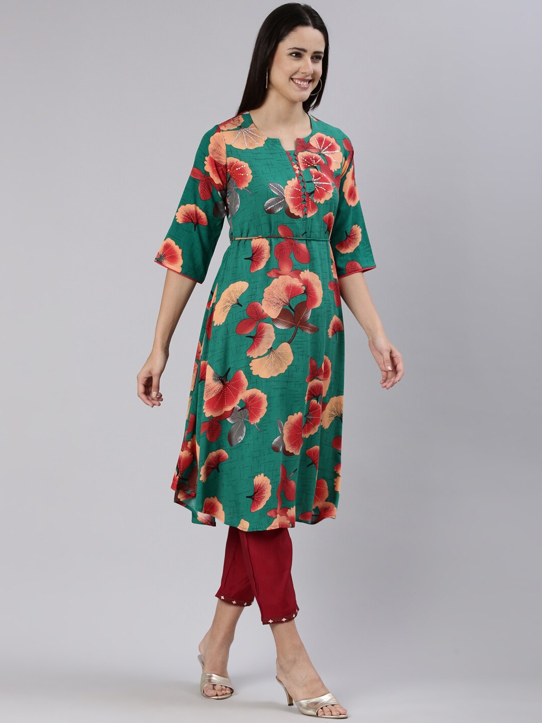 

Neerus Women Green Floral Printed Flared Sleeves Sequinned Kurta