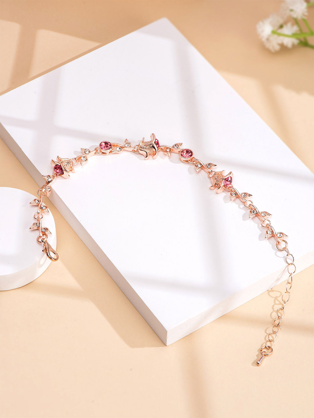 

Yellow Chimes Rose Gold-Plated Stone Studded Charm Bracelet