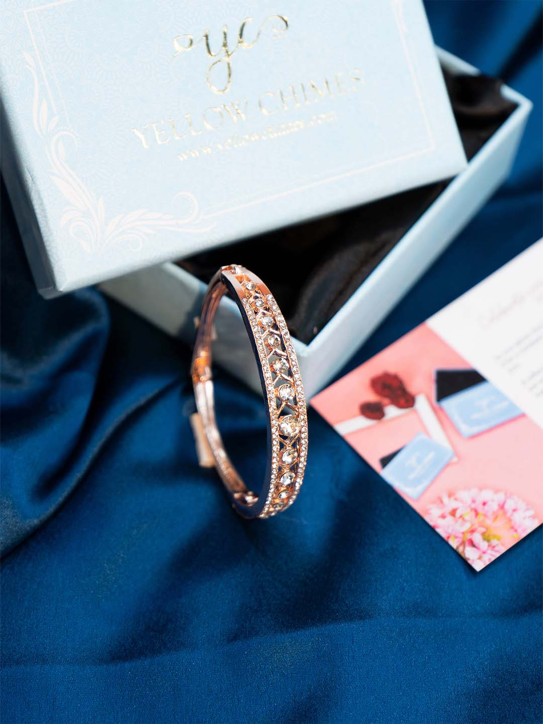 

Yellow Chimes Gold-Plated Stone Studded Bangle-Style Bracelet