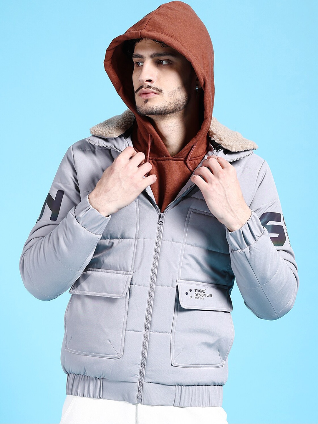 

The Indian Garage Co Men Grey Longline Outdoor Puffer Jacket with Patchwork