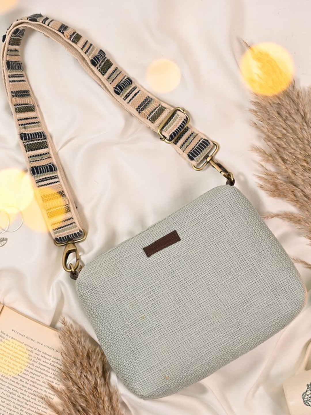 

Visual Echoes Green Structured Handheld Bag with Fringed