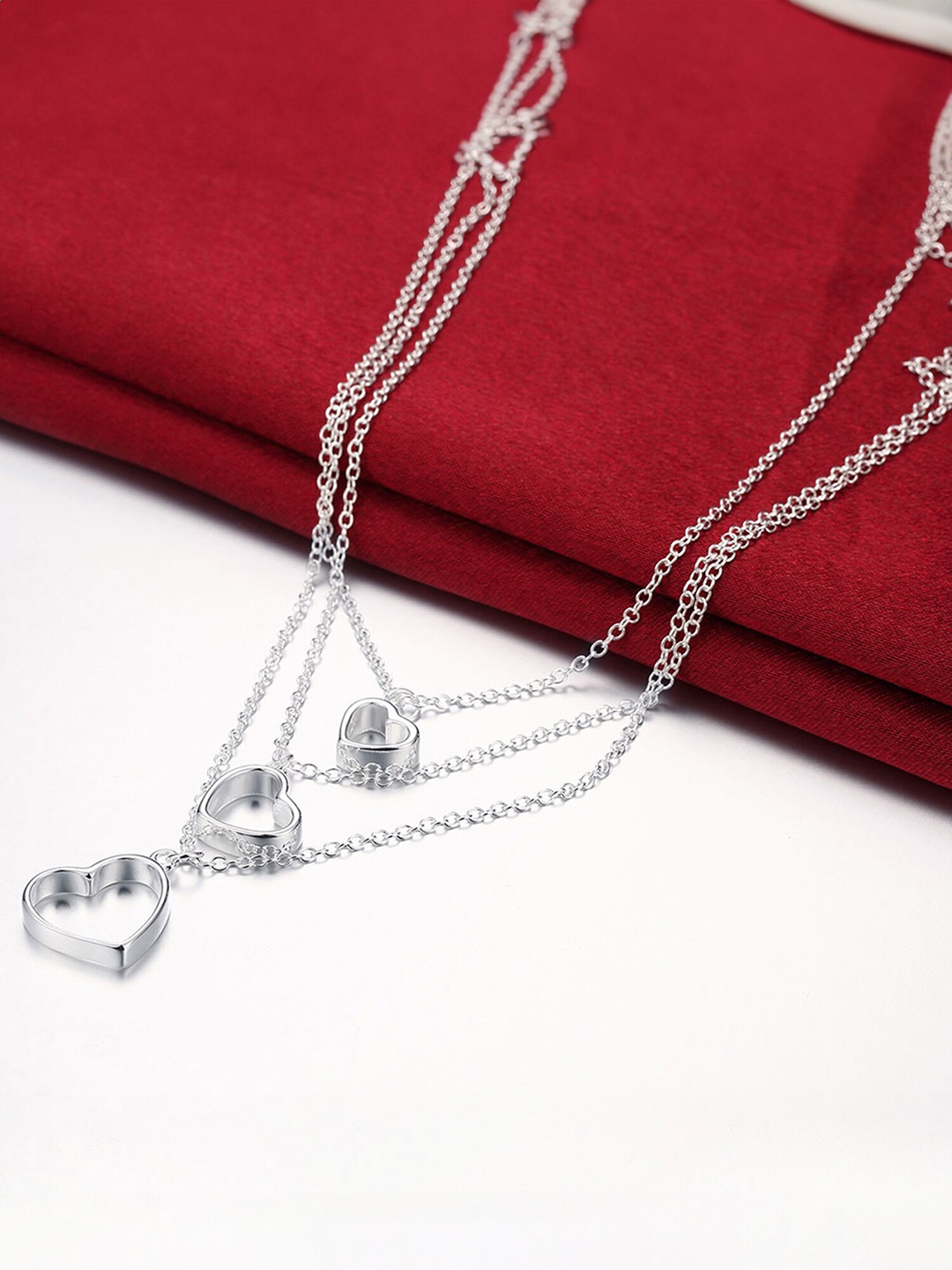 

Yellow Chimes Multi strand Heart Charm Silver Necklace