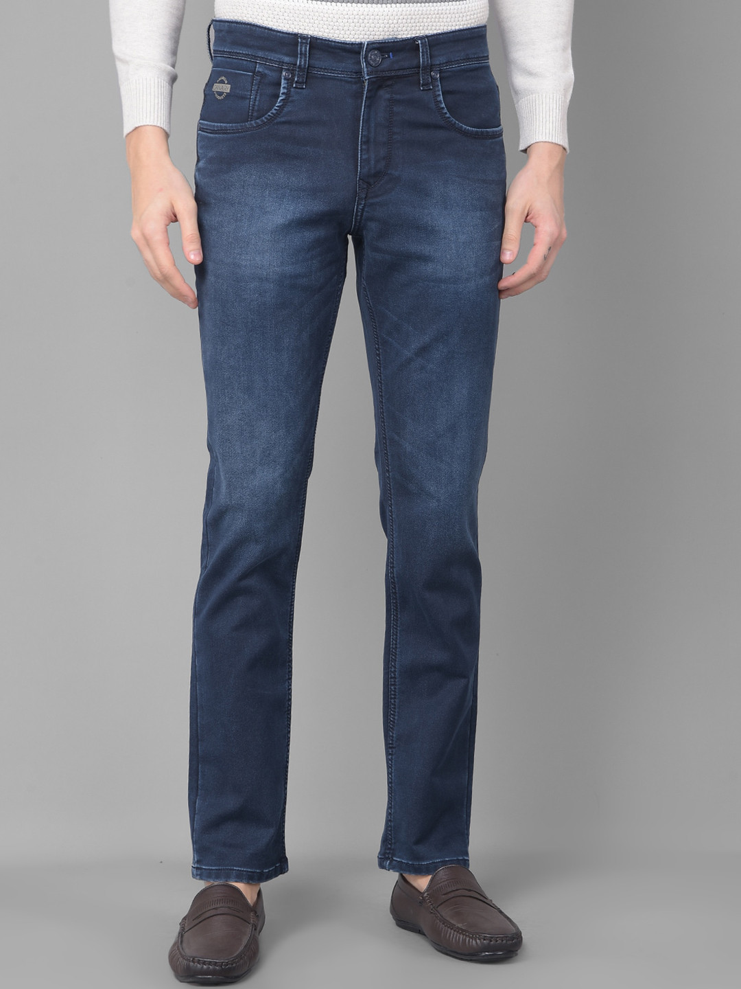 

Canary London Men Blue Smart Slim Fit Low-Rise Light Fade Printed Stretchable Jeans
