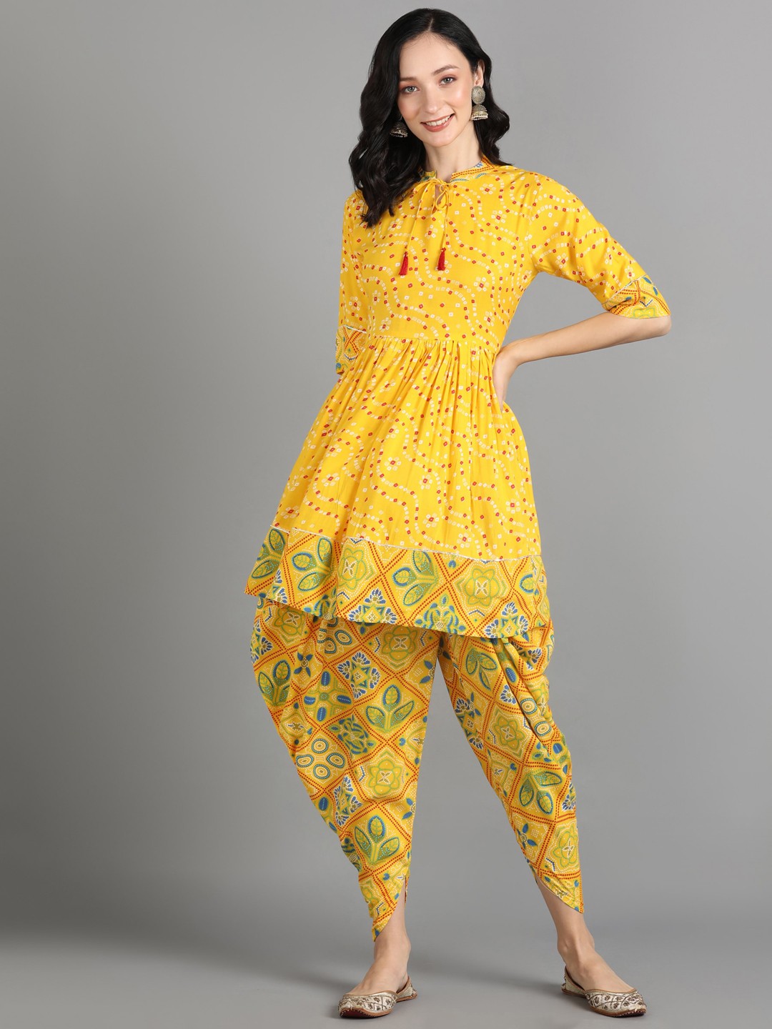 

AAYUMI Ethnic Motifs Printed Tie-Up Neck Gotta Patti Detailed A-Line Kurta With Dhoti Pant, Yellow
