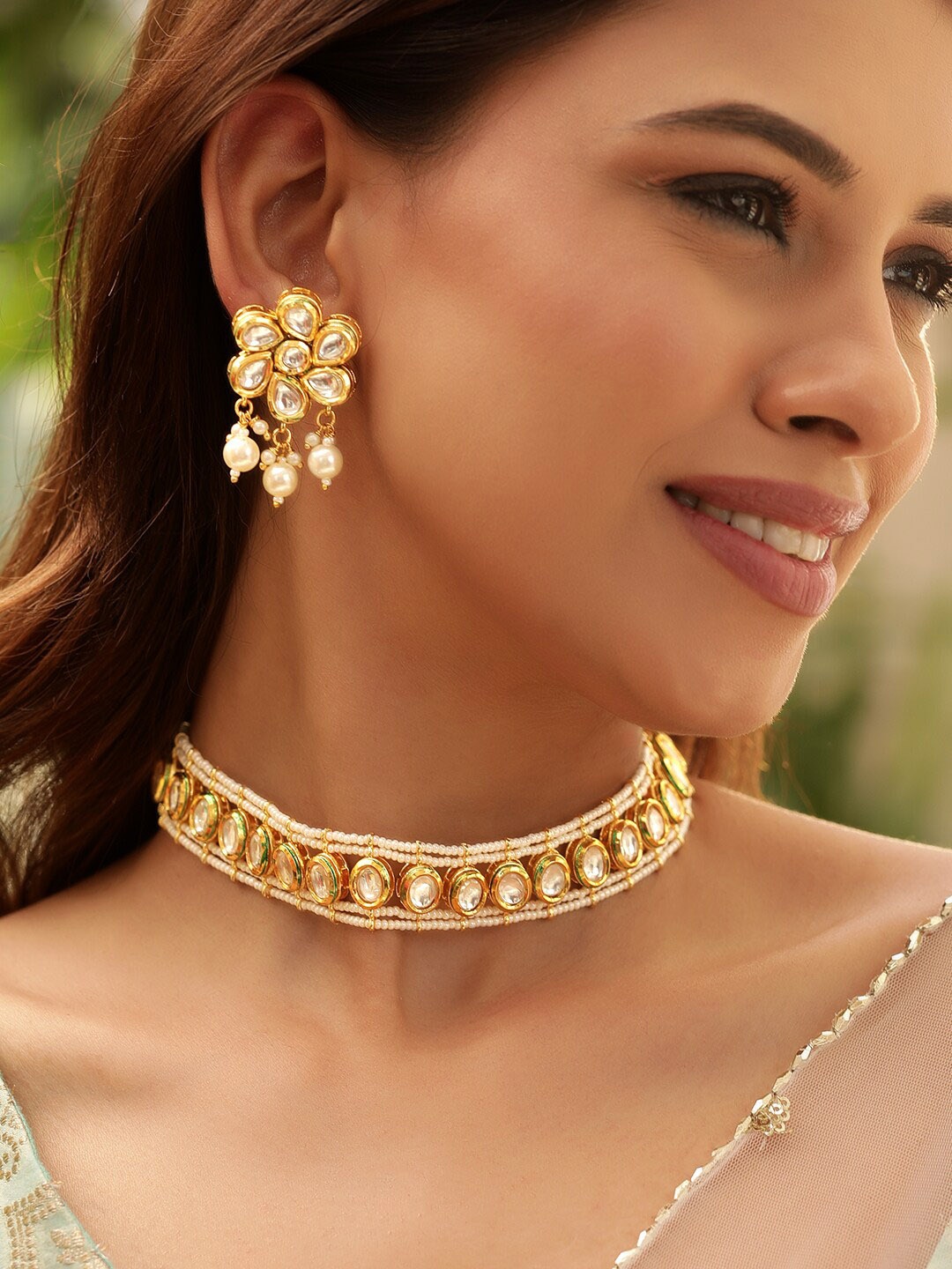 

Rubans Luxurious 22K Gold Plated Pearl beaded Kundan Choker Set