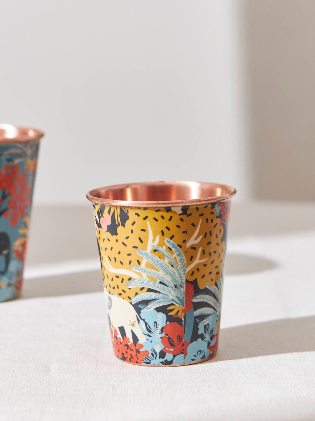 

Chumbak Jungle Drama Black Printed Copper Tumbler