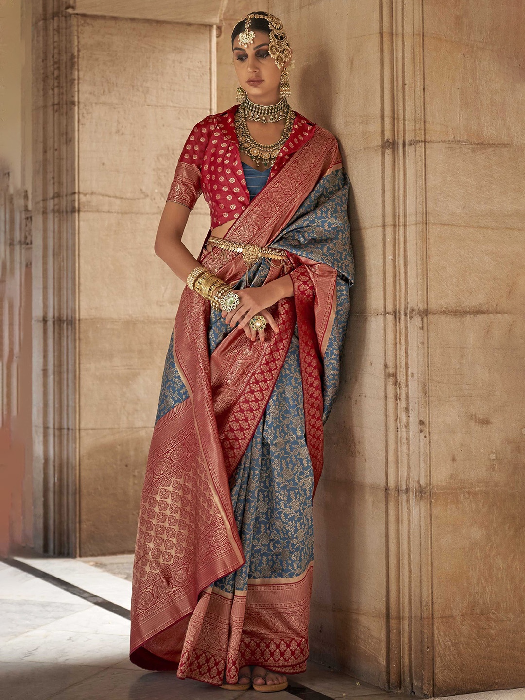 

Mitera Teal Blue Floral Woven Design Zari Detailed Banarasi Saree