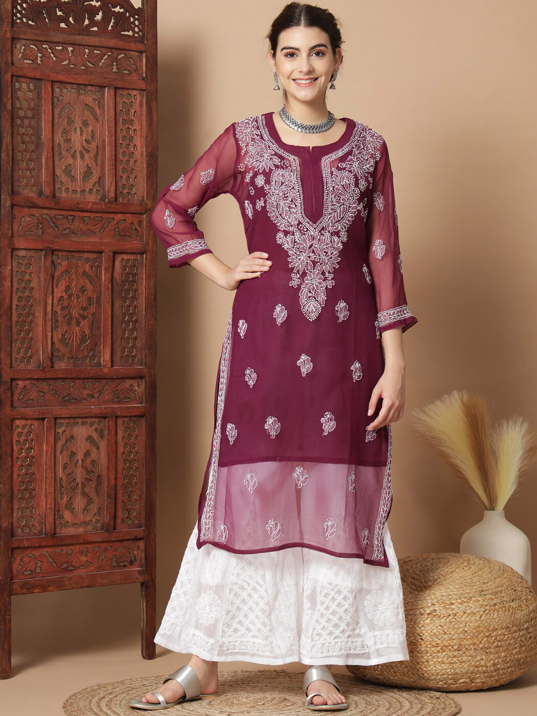 

Ethnava Ethnic Motifs Embroidered Regular Georgette Chikankari Kurta & Sharara With Slip, Maroon