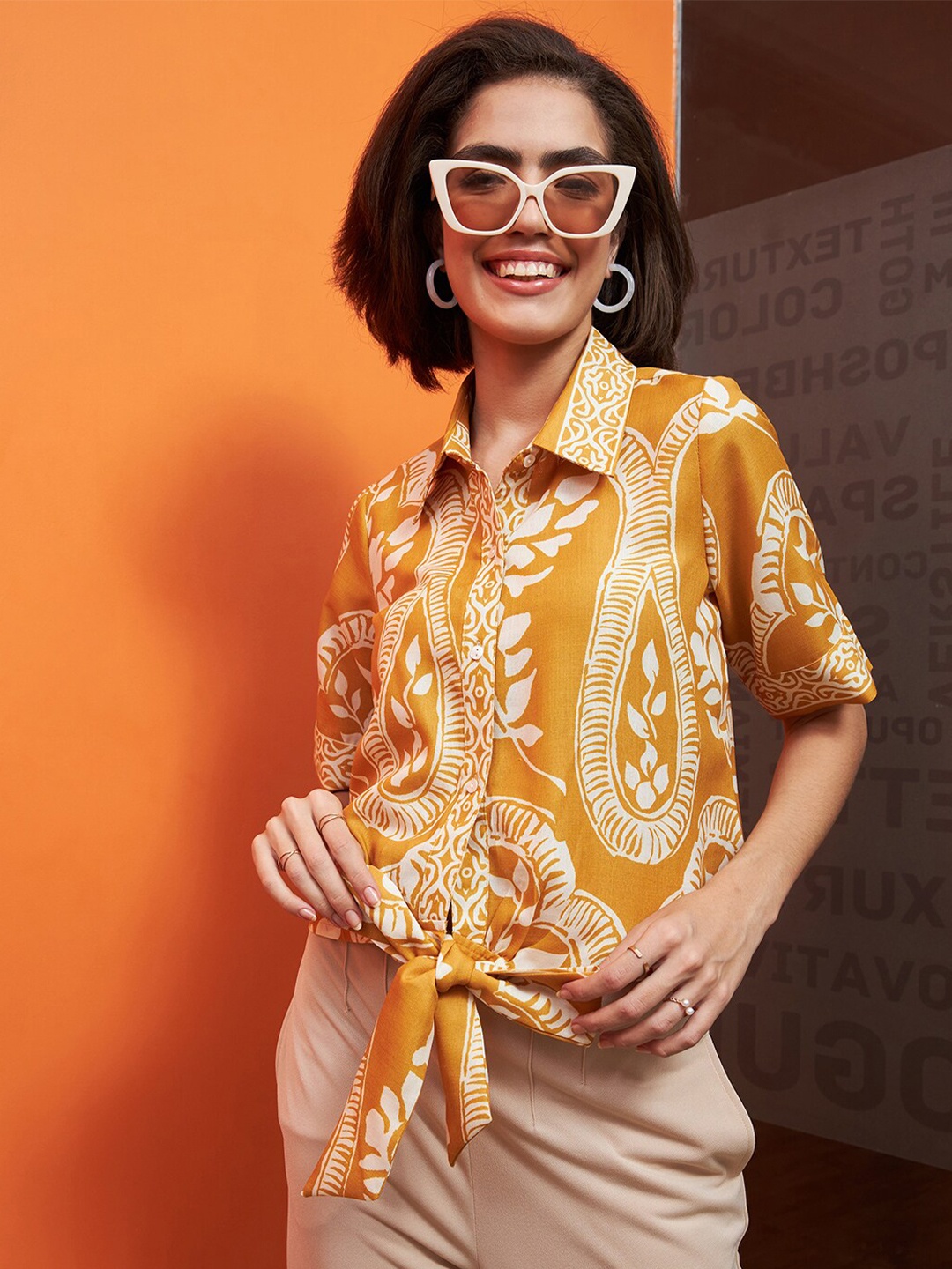 

Athena Immutable Mustard Yellow Ethnic Motifs Printed Front Knot Linen Shirt Style Top