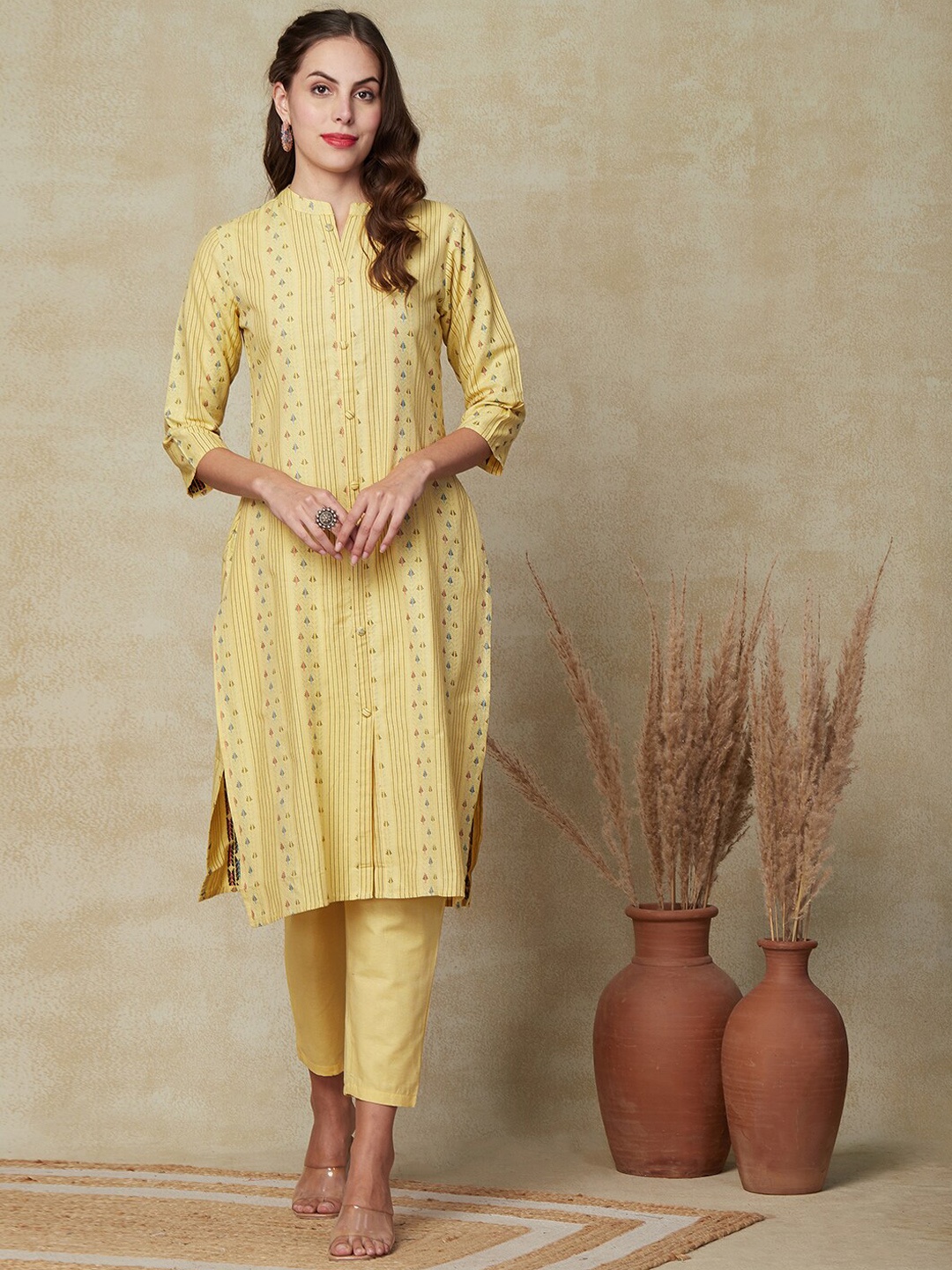 

FASHOR Geometric Printed Regular Pure Cotton Kurta with Trousers, Yellow