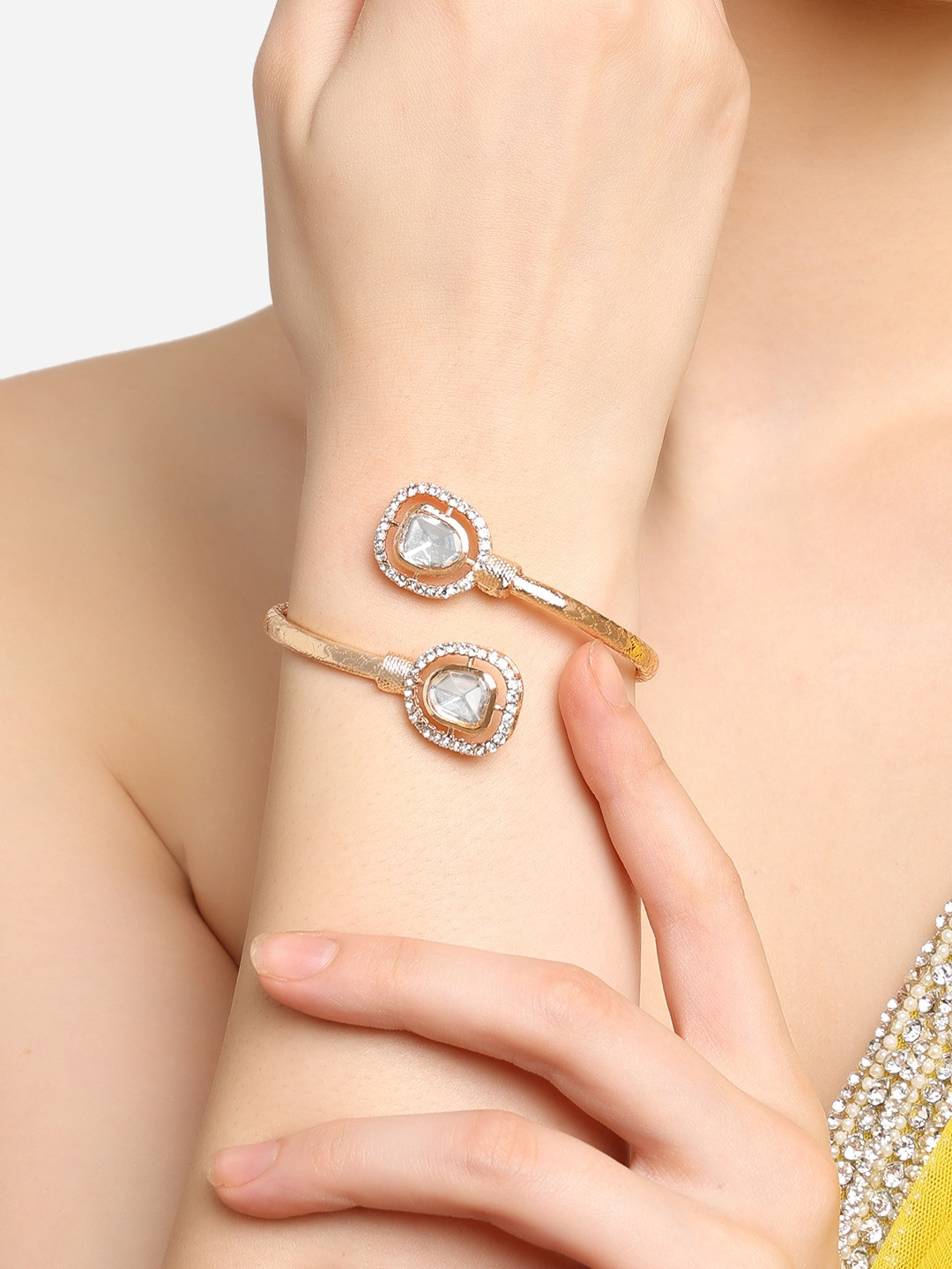 

Zaveri Pearls Women Gold-Plated Stone-Studded Kada Bracelet