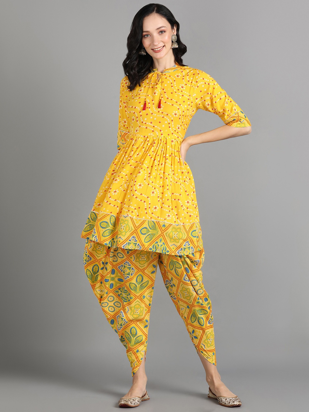 

KALINI Ethnic Motifs Printed Tie-Up Neck A-Line Kurti with Dhoti Pants, Yellow