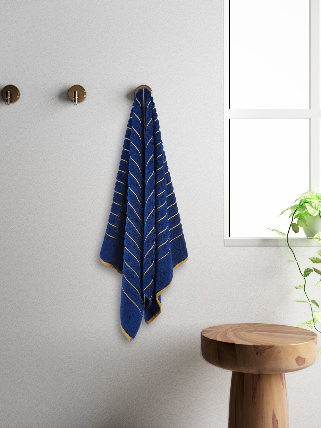 

SPACES Exotica Navy Blue Striped Anti-Bacterial 575 GSM Pure Cotton Bath Towel