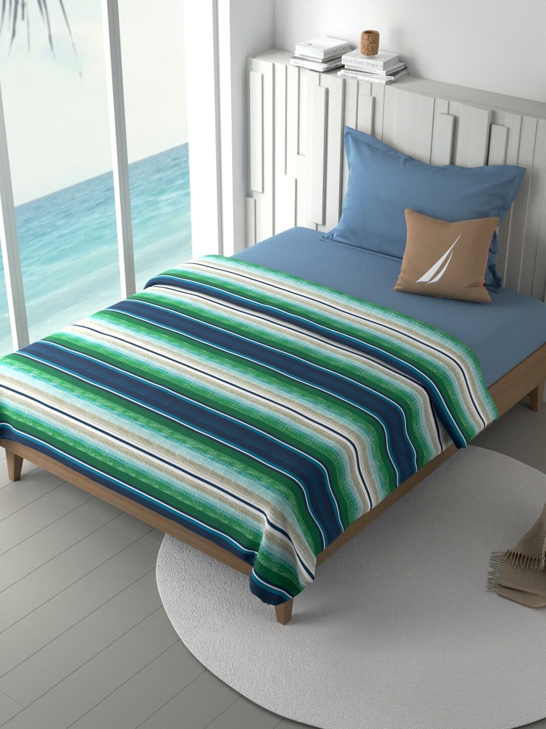 

Nautica Blue & White Striped Cotton AC Room Single Bed Dohar
