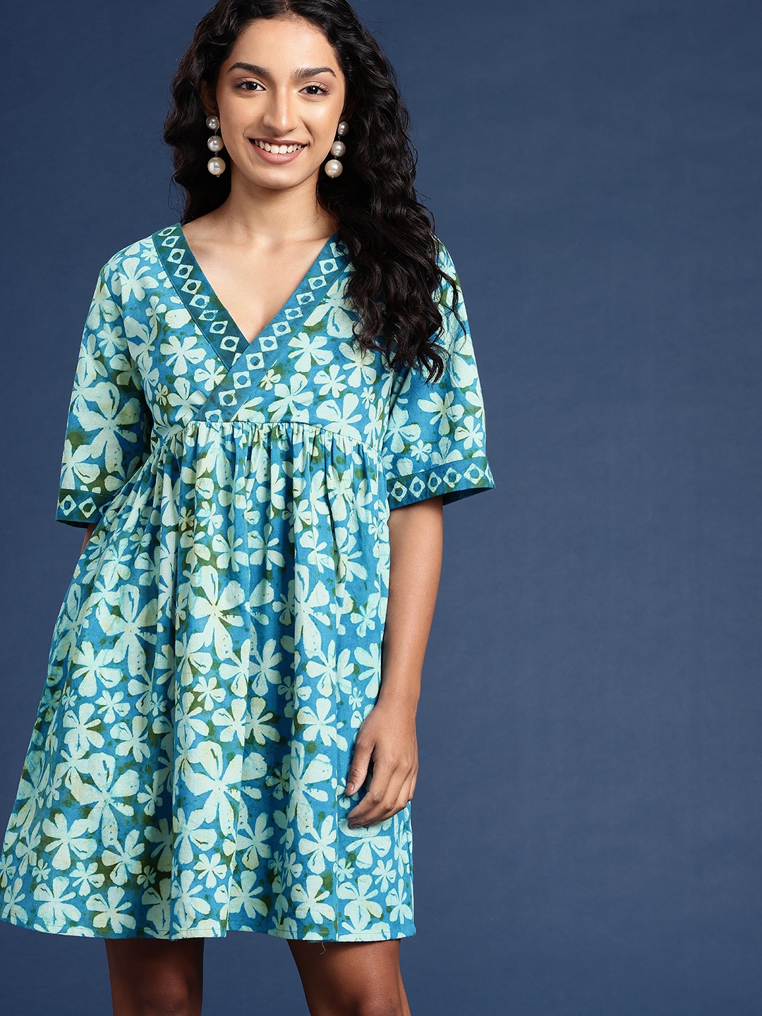 

Taavi Pure Cotton Floral Printed A-Line Rangeen dabu Ethnic Dress, Blue