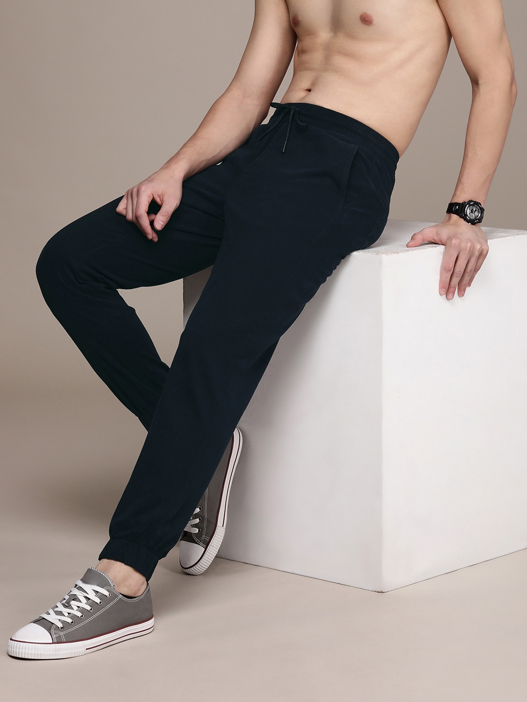

The Roadster Life Co. Men Pure Cotton Mid Rise Joggers Trousers, Navy blue