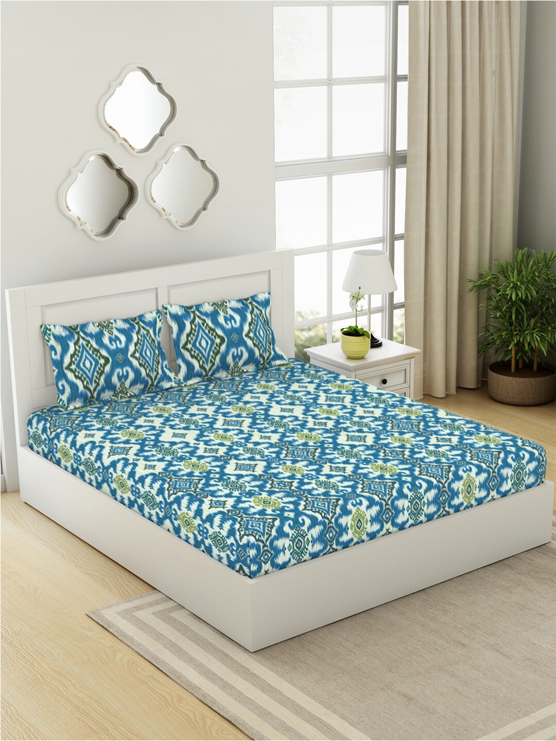 

SPACES Ikkat Blue & White Ethnic Motifs Cotton 144 TC King Bedsheet With 2 Pillow Covers