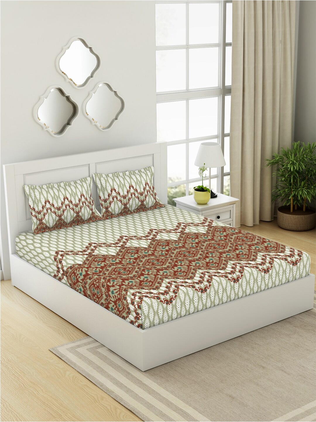 

SPACES Ikkat Orange & Green Printed Cotton 144 TC King Bedsheet with 2 Pillow Covers
