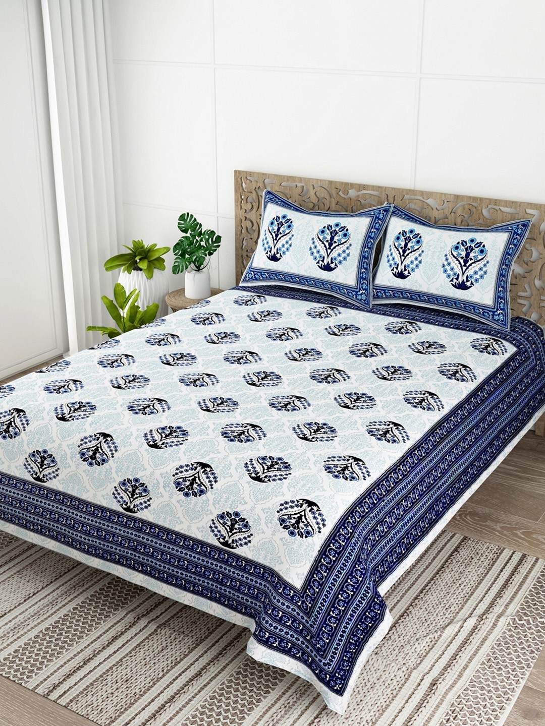 

Salona Bichona Blue & White Ethnic Cotton 120 TC Queen Bedsheet with 2 Pillow Covers