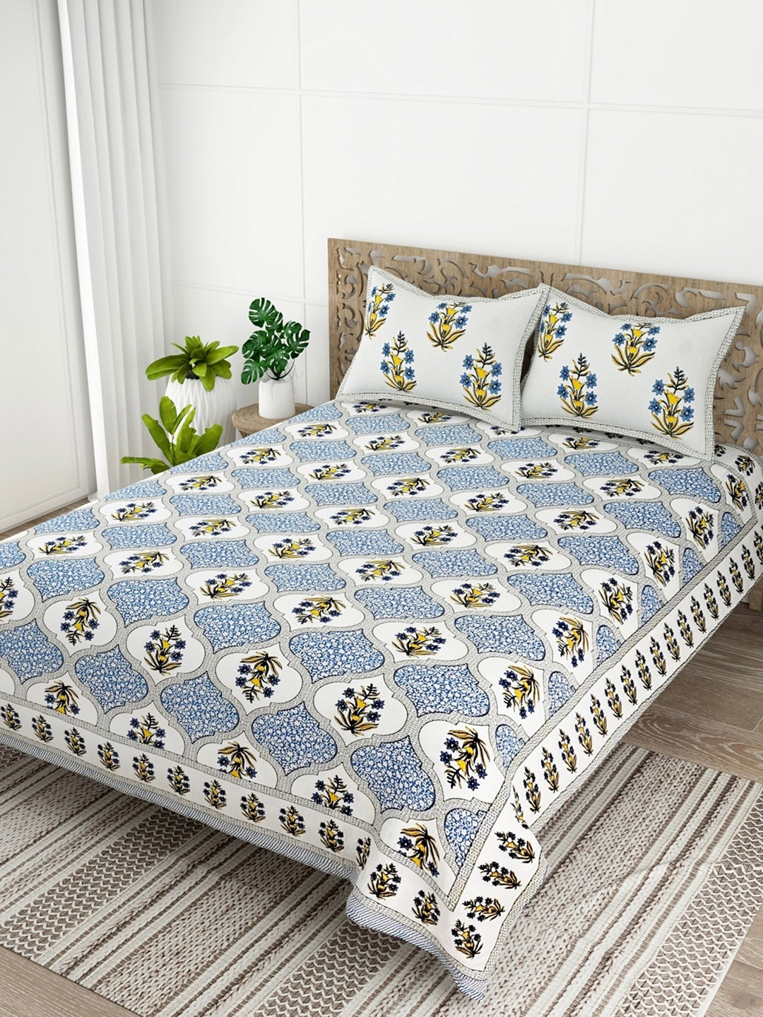 

Salona Bichona Blue & White Floral Cotton 120 TC Queen Bedsheet with 2 Pillow Covers